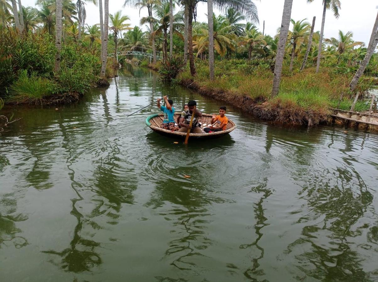 Aqua Green Home Stay Munroe Island Esterno foto